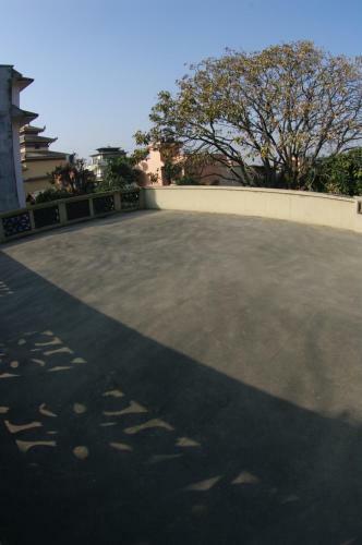 Hostal Laughing Buddha Hotel & Garden Theater