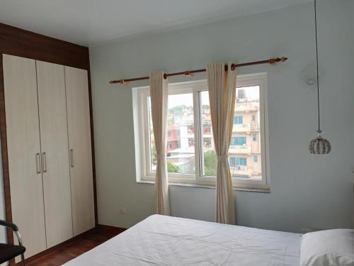 Four Red Doors Apartments Pvt.ltd. (sorakhutte ,rayamaji Marga )