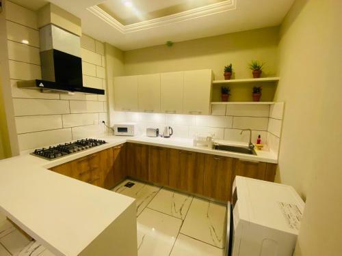 Holidazzle Serviced Apartments Bahria Town