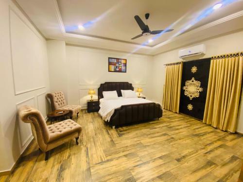 Holidazzle Serviced Apartments Bahria Town