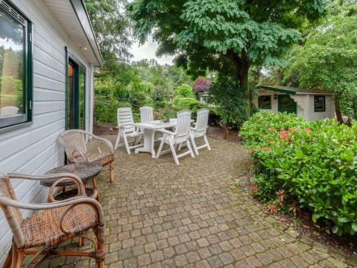 Beautiful Chalet With Swimming Pool In Stegeren