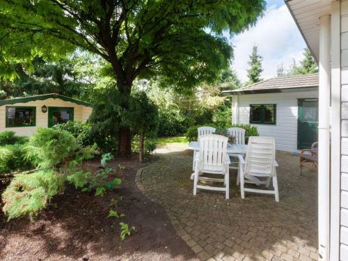 Beautiful Chalet With Swimming Pool In Stegeren