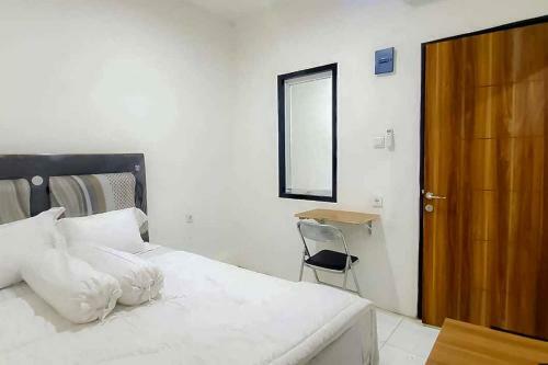 Hotel Maminoti Syariah Residence Redpartner