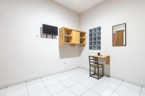 Hotel Maminoti Syariah Residence Redpartner