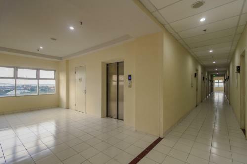 Hostal Reddoorz Apartment @ Dramaga Tower