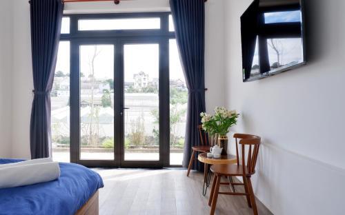 Hostal Th?nh ?i?n Home - ?� L?t