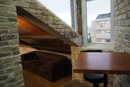 Tiny And Cute Apartment In The Roof Touching Border
