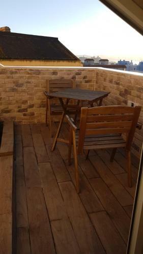 Tiny And Cute Apartment In The Roof Touching Border
