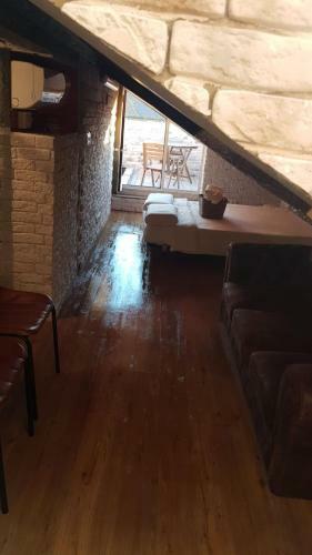 Tiny And Cute Apartment In The Roof Touching Border