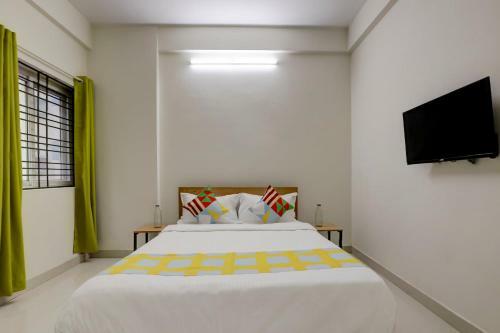 Hostal Oyo 79887 The Purple Orchid Stay