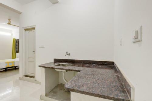 Hostal Oyo 79887 The Purple Orchid Stay