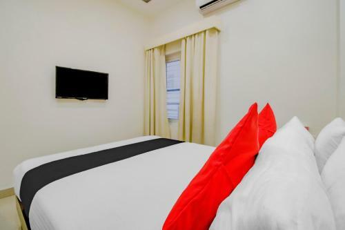 Capital O 77528 Smile Hotels