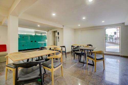Capital O 77459 Smile Hotels