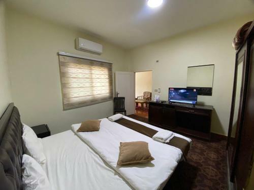 Apartamento Alsultan Palace Hostel