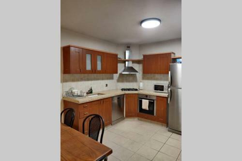 Stylish Private Garden Apartment W/ A Pool & Gym.