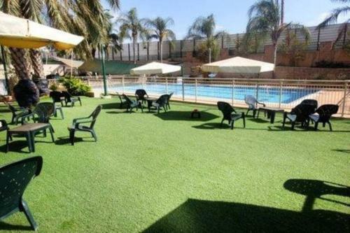 Stylish Private Garden Apartment W/ A Pool & Gym.
