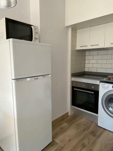 Apartamento Piso En Coraz�n de Fenals. Playas, Piscina, Terraza.