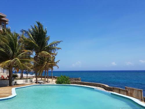 Apartamento Whispering Seas Oceanfront Suite