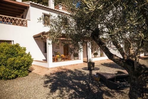 Casa Grande / Rosas Cantares
