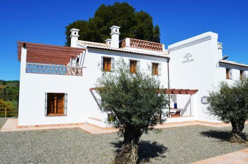 Casa Grande / Rosas Cantares