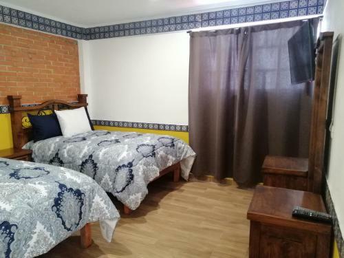 Apartamento Hotel Y Suites Axolotl