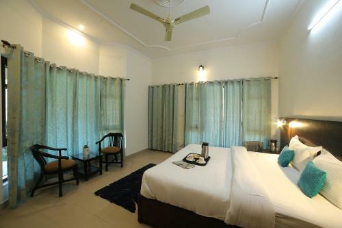 Saffronstays Ghughuti Ku Baasa