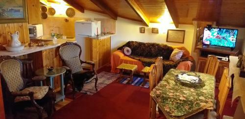Apartamento Arachova Houses-sofita