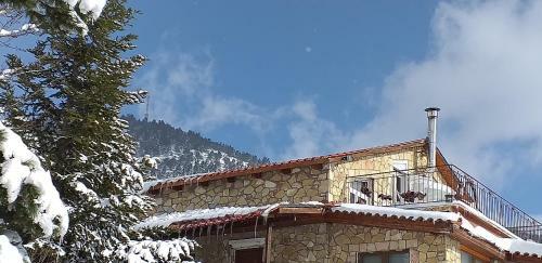 Apartamento Arachova Houses-sofita