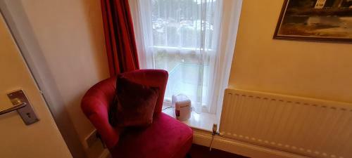 Hostal Holly Cottages