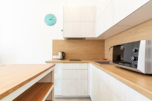 White Sand Apartment With A Balcony, By Cohost