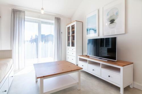 White Sand Apartment With A Balcony, By Cohost