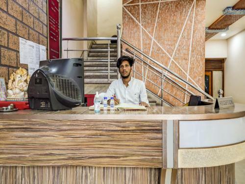 Capital O 79766 Hotel Star International