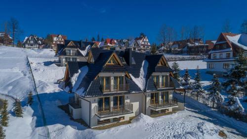 Tybet Domki I Apartamenty