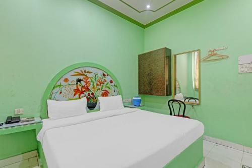 Hotel Capital O 86046 Uday Raj Lawn