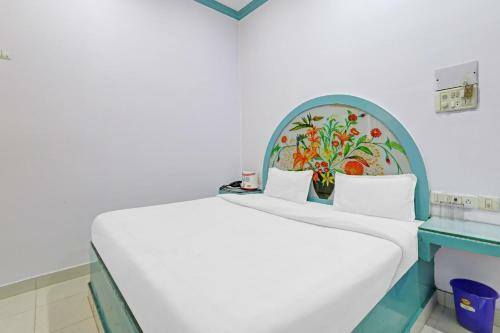 Hotel Capital O 86046 Uday Raj Lawn