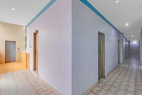 Hotel Capital O 86046 Uday Raj Lawn