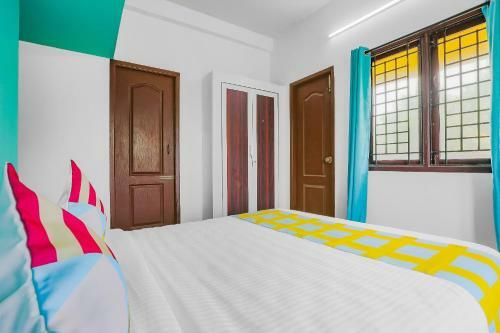 Hostal Oyo Home 49116 Vibrant Stay Near Uthandi Beach