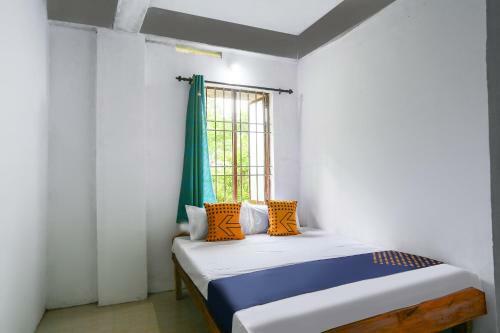Hotel Spot On 49577 Thozhupaadan Residency