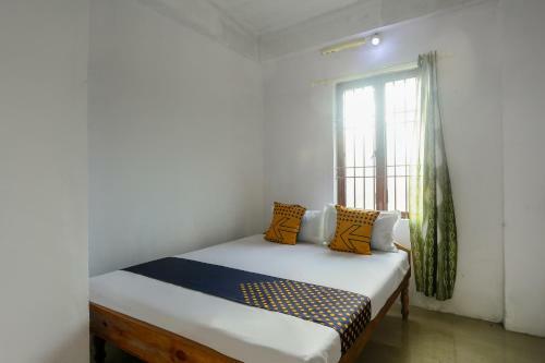 Hotel Spot On 49577 Thozhupaadan Residency