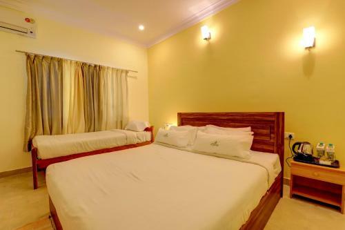 Hotel Ezzenza Royal Garden Brindavan Resort
