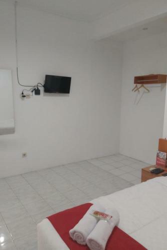 Hotel Reddoorz Near Gor Uny