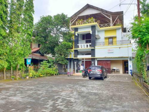 Hotel Homestay E-kost Candi Gebang Redpartner