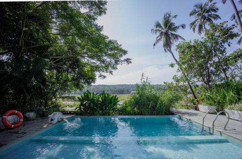 Villa Loto Bianco By Hireavilla, Siolim
