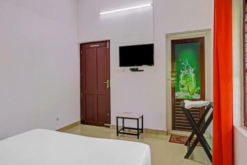 Hotel Capital O 84184 Pop Tavern Kazhakkottam