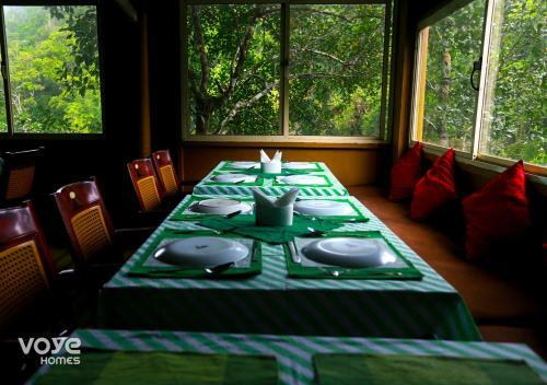 Hotel Voye Homes Oxyfarm Resorts