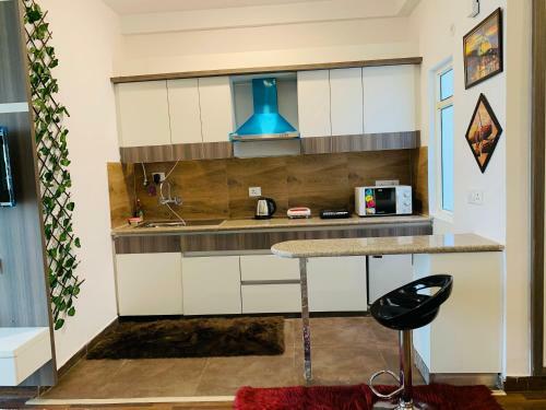 Apartamento The Vogue Square Near India Expo Mart