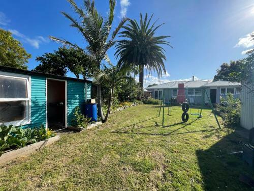 Palm And Fruit Tree Haven, With Spacious Outdoor Areas, In Central Mount.