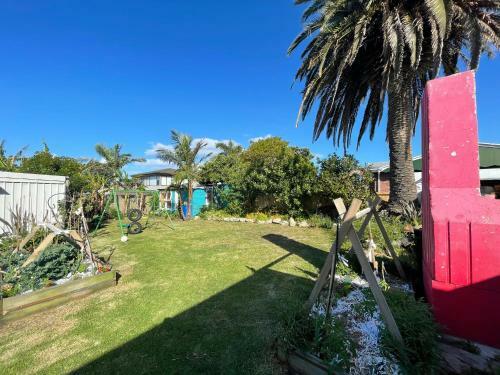 Palm And Fruit Tree Haven, With Spacious Outdoor Areas, In Central Mount.