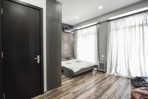 Apartamento Ioseliani's Home