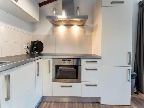 Inviting Bungalow In Epe With Hot Tub